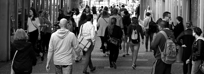 Black and white photo of people walking