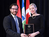 Deborah Templar receiving the Young Lawyers Pro Bono Award from Mathieu Leblanc-Gagnon, Chair of Young Lawyers - Canadian Bar Association