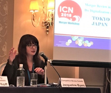 Jacqueline Byers speaking at conference